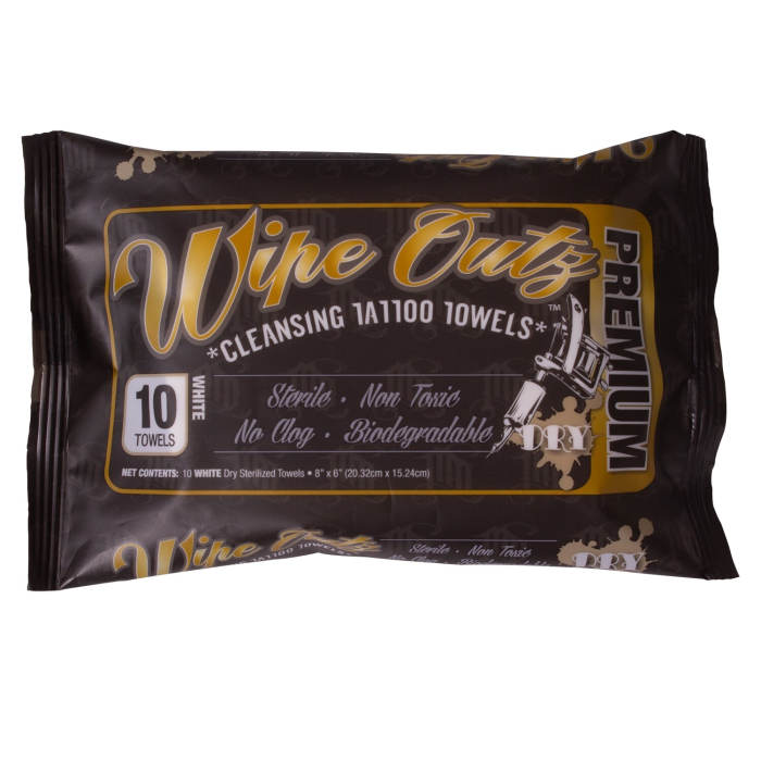 Un paquet de 10 Wipe Outz Dry - Lingettes sèches pour tatouage, dans un emballage noir et or, étiqueté comme stérile, non toxique, non obstruant et biodégradable. Contient 10 lingettes sèches blanches.